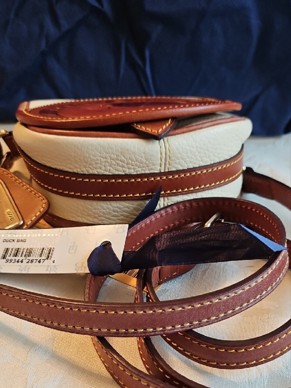 Dooney & Bourke Cream and Brown Leather Duck Crossbody - Picture 2 of 8